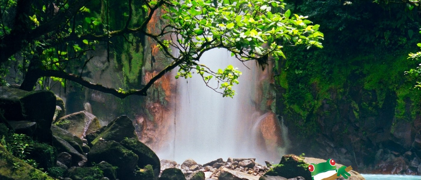 Rio Celeste waterfall cascading through jungle